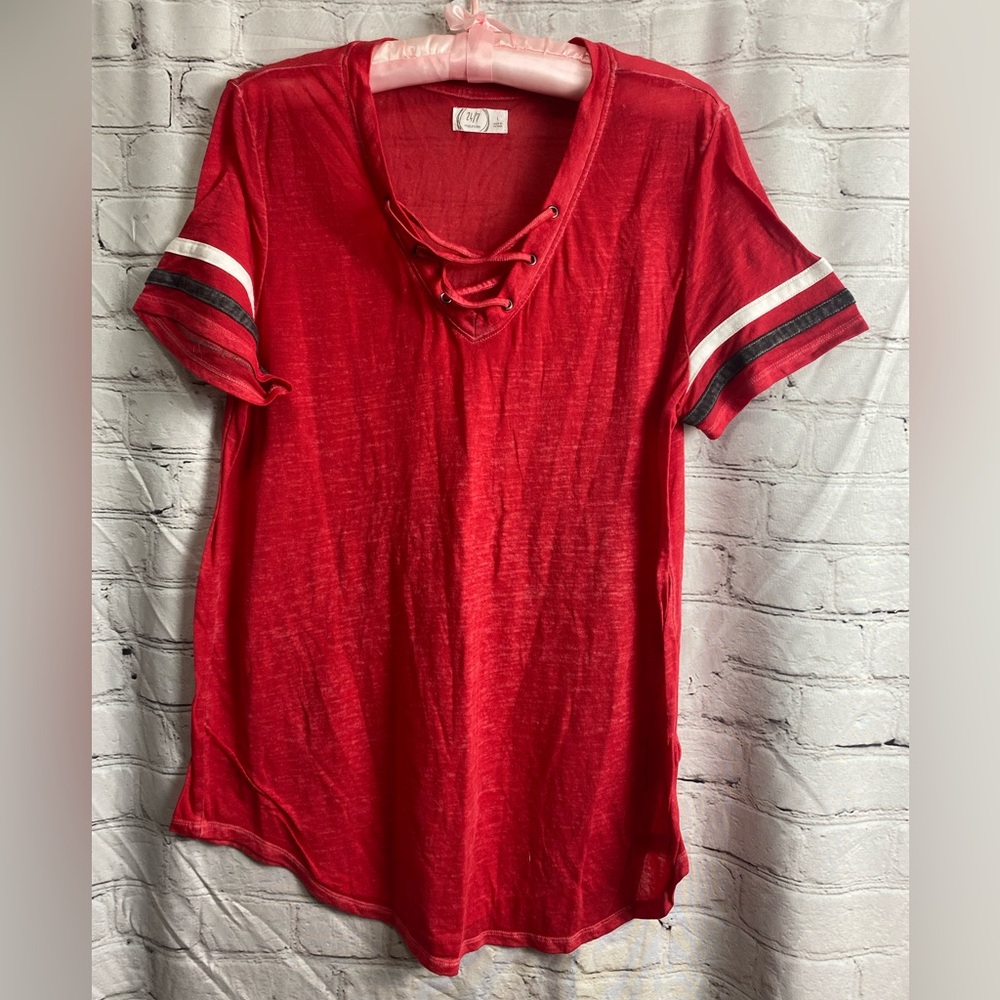 Maurice’s lace up, thin, Red top. Size L